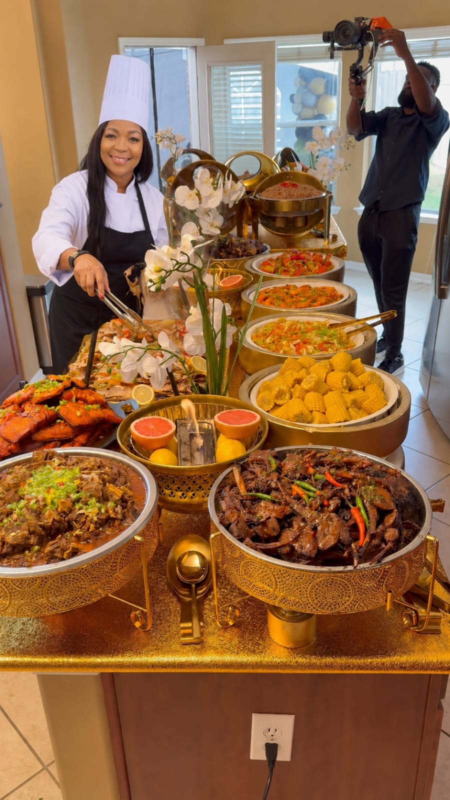 Professional funeral catering buffet with chafing dishes and plated meals